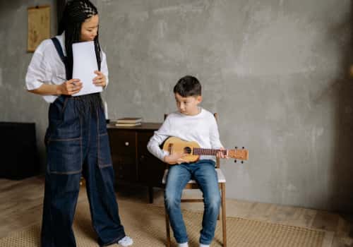 Teaching the child Ukulele