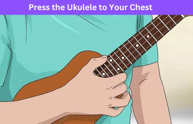 Hold A ukulele